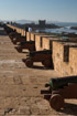 A line of old cannons guard the walls of the town of Essaouira in Morocco